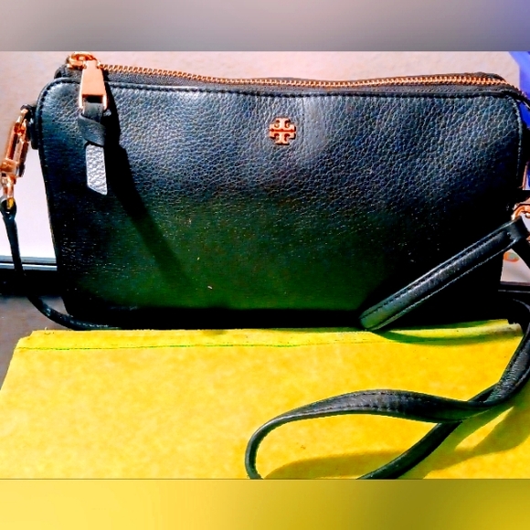 Tory Burch Black Leather Cross body Purse with brass buckle adjustable strap. - Picture 7 of 16